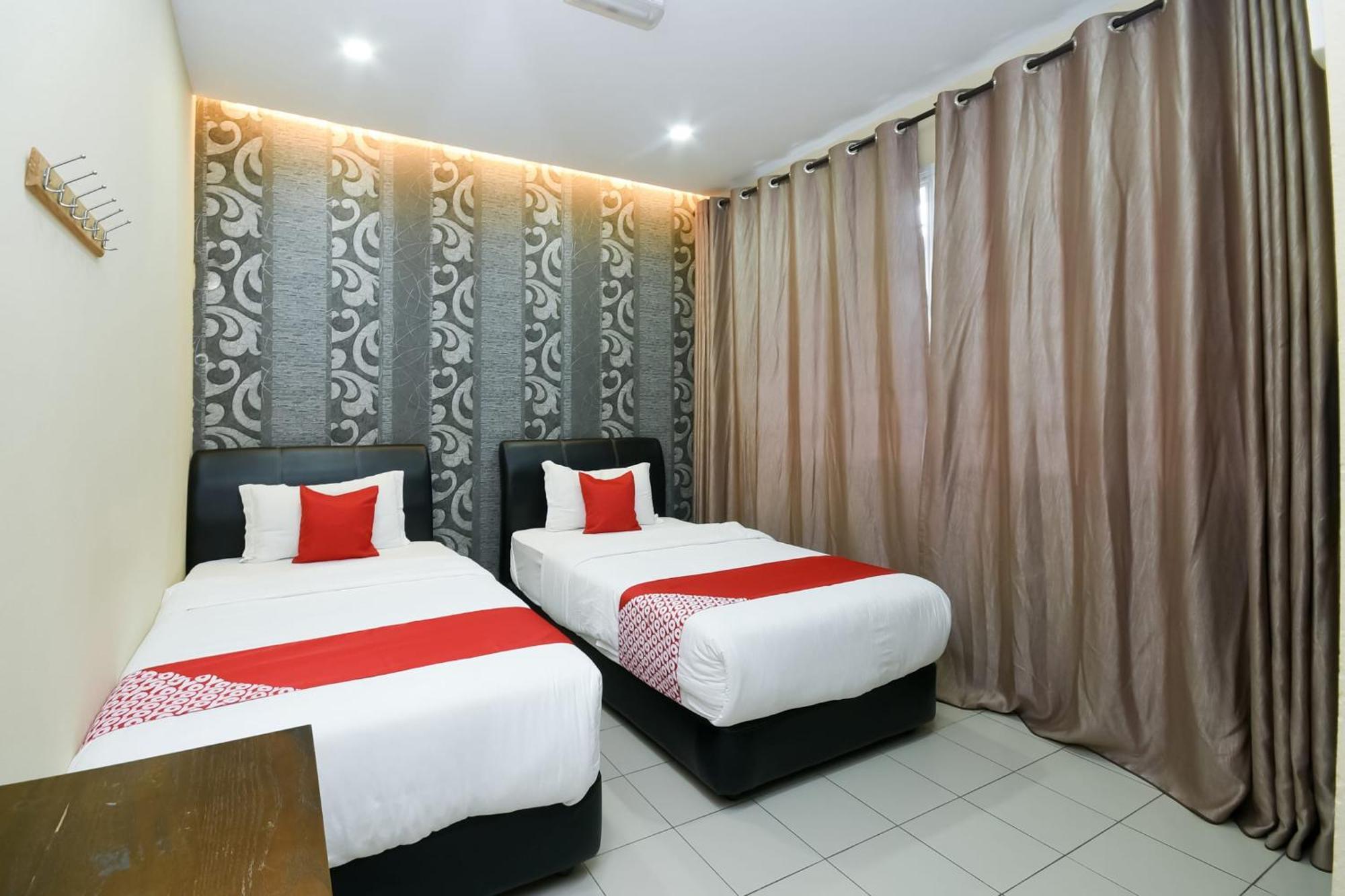 Oyo 89301 Ys Inn Miri Extérieur photo